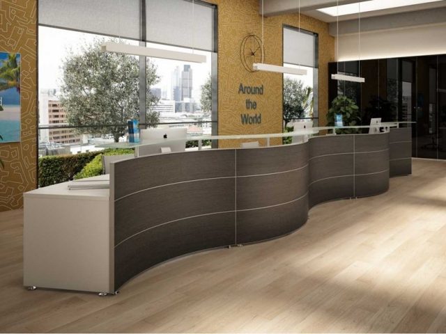 Bàn lễ tân lượn sóng nhẹ nhàng và tăng diện tích sử dụng 