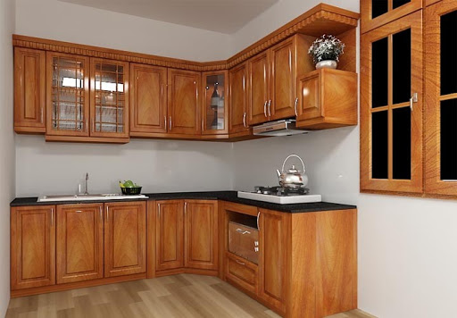 Màu sắc sang trọng của tủ bếp được làm từ xoan đào 